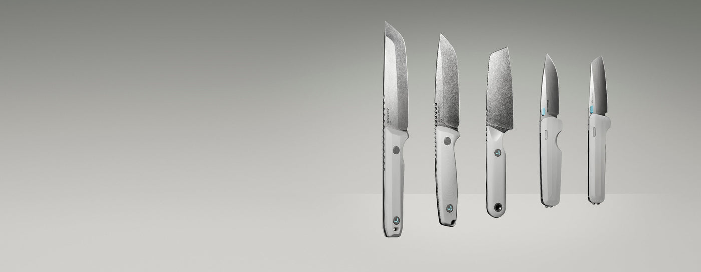 Product display image featuring five Leatherman knives in a clean, gradient-lit studio setting. The lineup includes various blade styles and handle orientations, all in a matching alpine white colorway, showcasing both profile and edge-on views to highlight the craftsmanship and design variations.