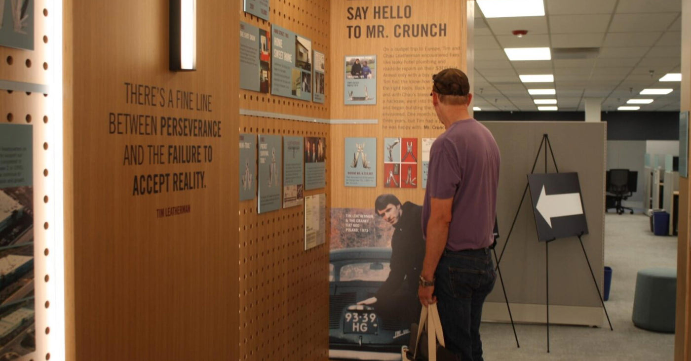 Translation missing: en.a man studies a display of information, showing interest in the data and visuals provided
