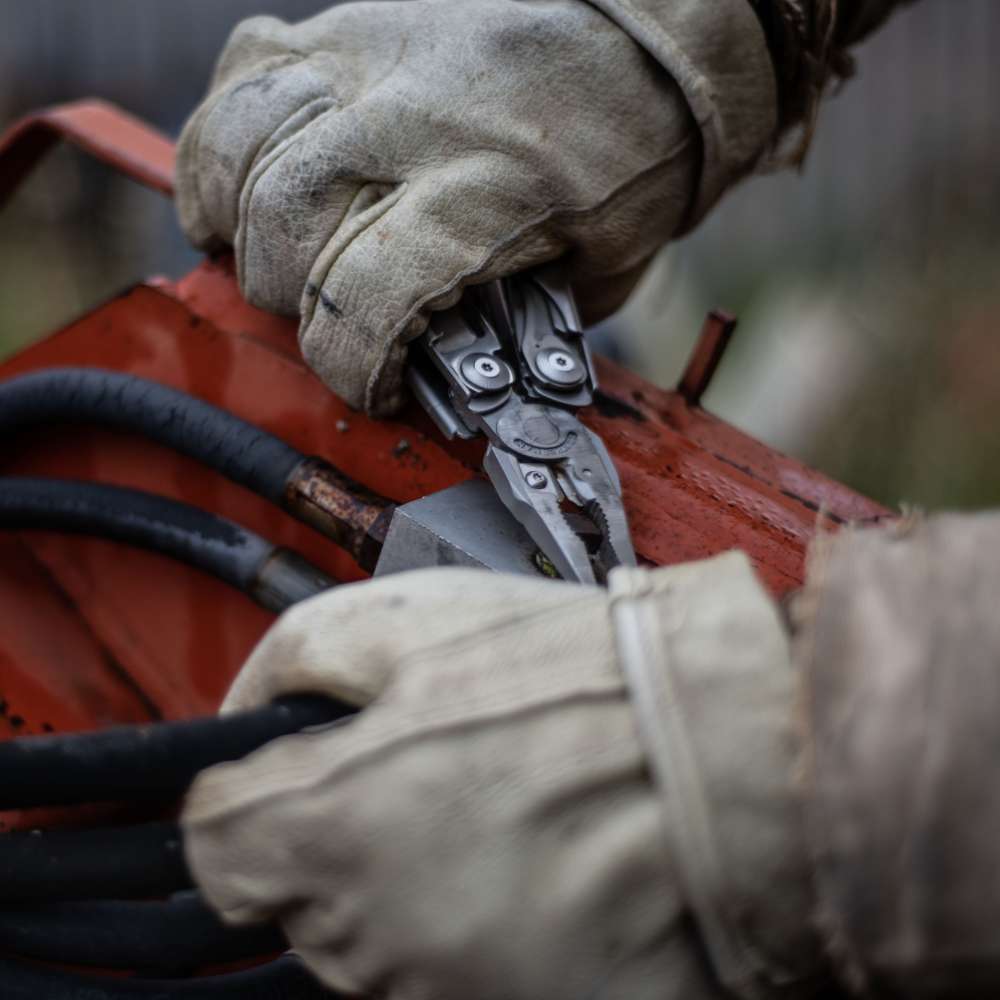Leatherman Surge in gloved hands