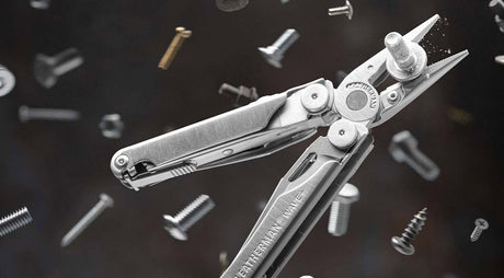 Translation missing: en.Stainless steel Leatherman Wave® Plus multitool showcasing the pliers surrounded by various screws