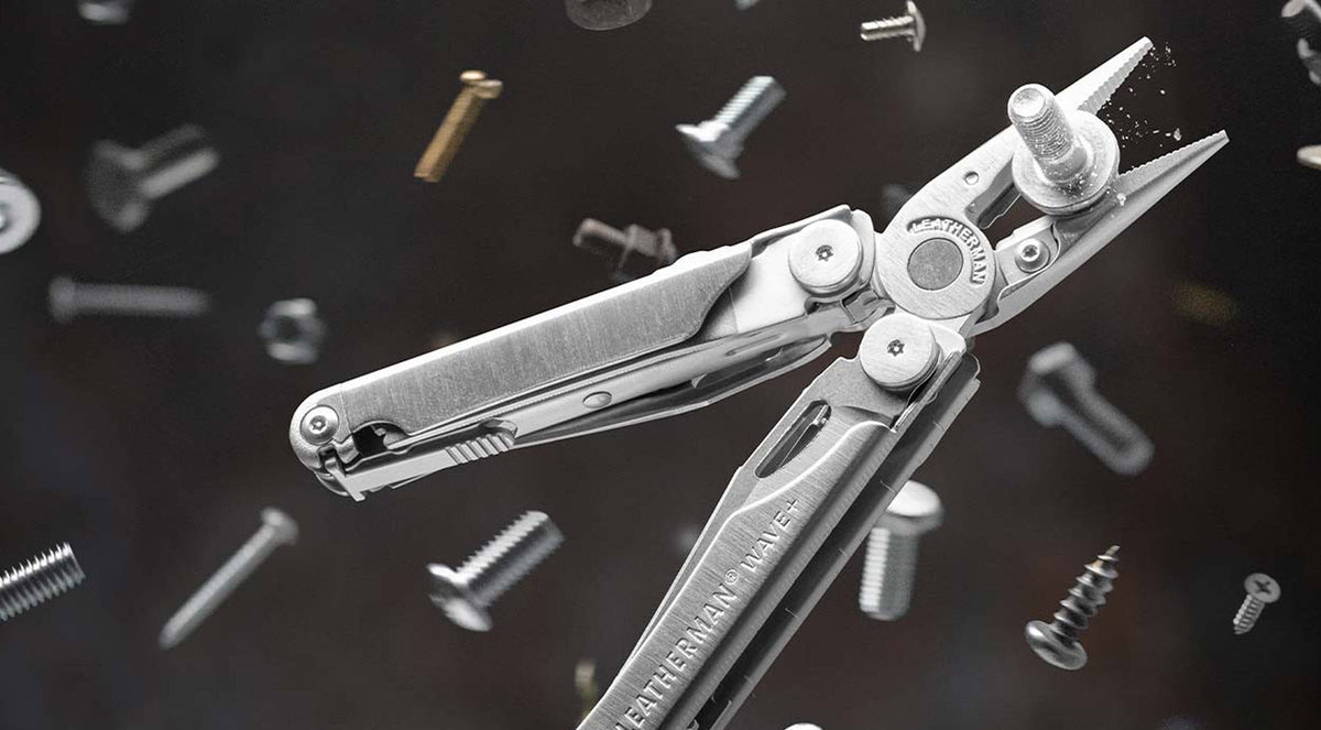 Stainless steel Leatherman Wave® Plus multitool showcasing the pliers surrounded by various screws.