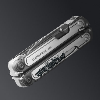 A Black & Silver Leatherman ARC multi-tool customized with a speeding car graphic.