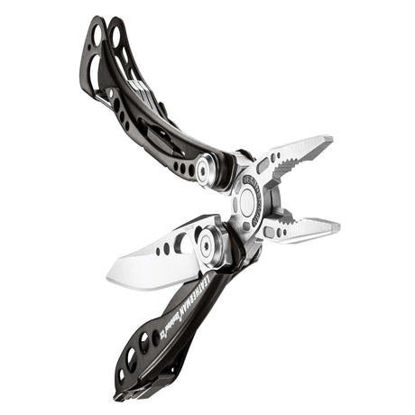 Translation missing: es.Black &amp; Stainless Leatherman Skeletool® CX multi-tool beauty image showing the various tools and features