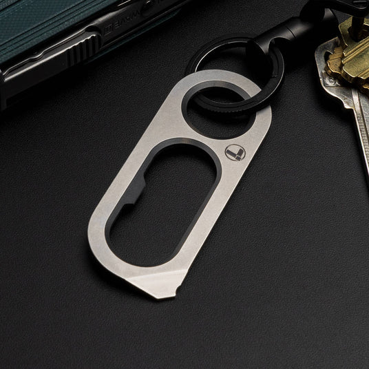 Translation missing: es.Leatherman OPNR keychain tool with integrated bottle opener and pry tool attached to a key ring