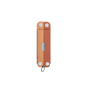 Translation missing: en.Pumpkin Spice Leatherman Micra® multi-tool closed, showcasing its compact design and keychain attachment