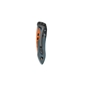 Translation missing: en.Closed back view of a Skeletool® KBX in Aurora color showcasing its compact size, bottle opener and pocket clip