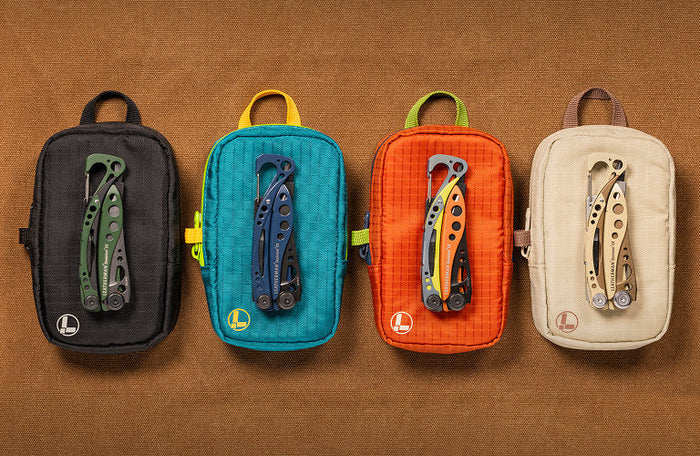 Translation missing: en.Four Leatherman Tool Pouches featuring Skeletool® CX in green, blue, and orange colors showcasing new colorways
