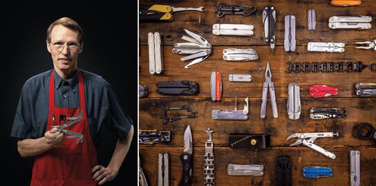 Tim Leatherman next to a showcase of many of the different styles of Leatherman tools
