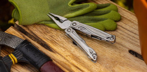 Leatherman Wingman opened up on top of gardening gloves