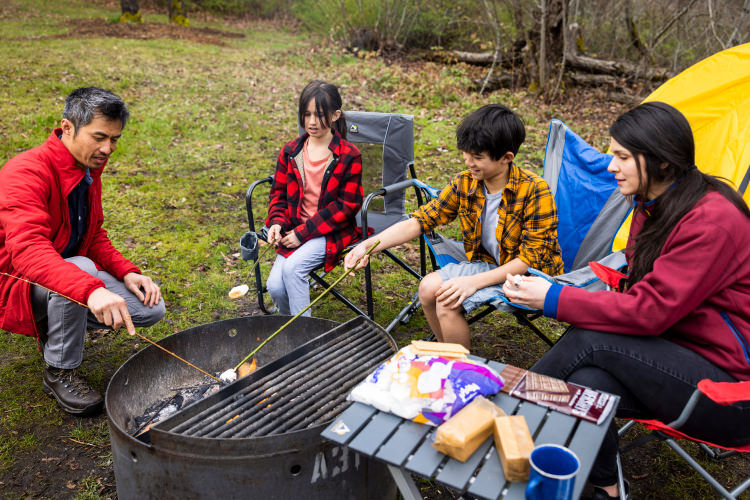 family roasting marshmallows