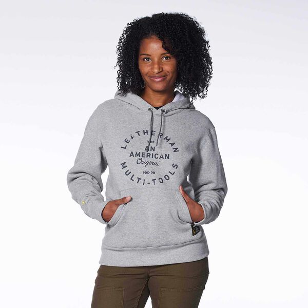 Gray Pullover hoodie with heritage badge on a model front