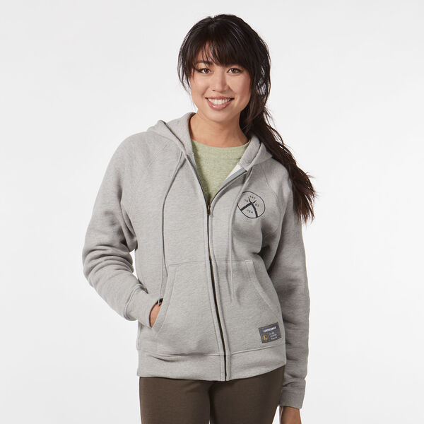 model in a multi-tool zip up hoodie