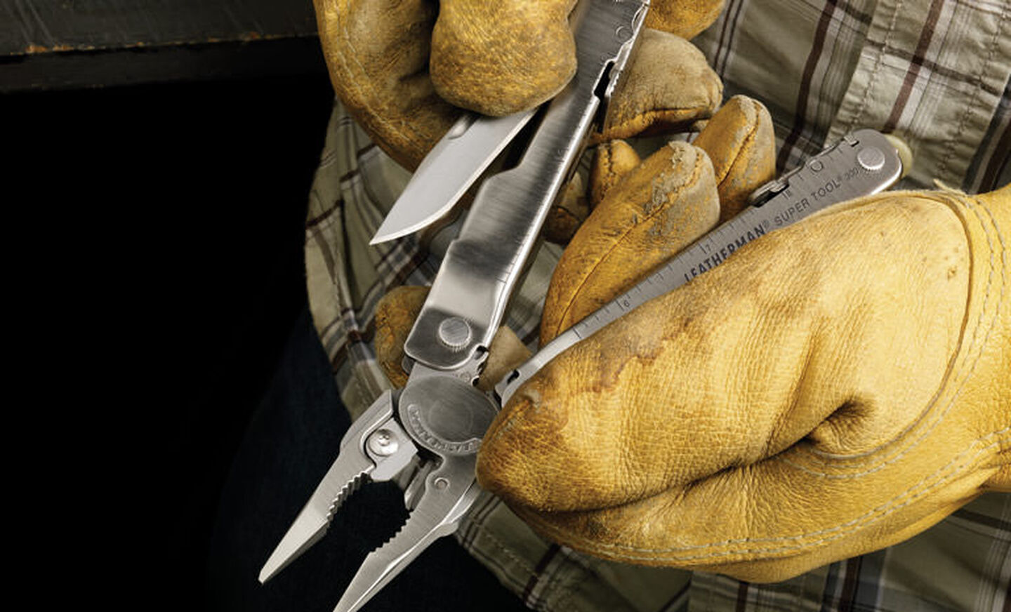 Leatherman stainless steel heritage super tool 300 multi-tool in hand