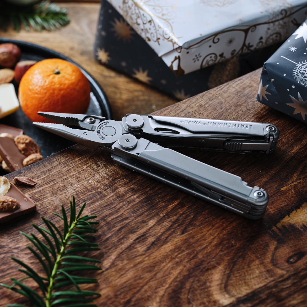 Leatherman Wave next to wrapped gifts
