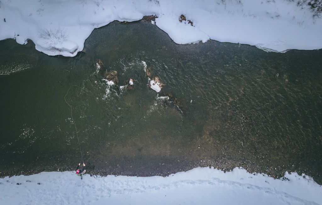 Overhead view of winter fly fishing.