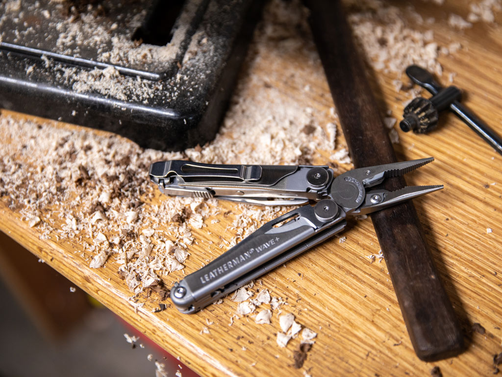 Leatherman on a work bench with wood chips